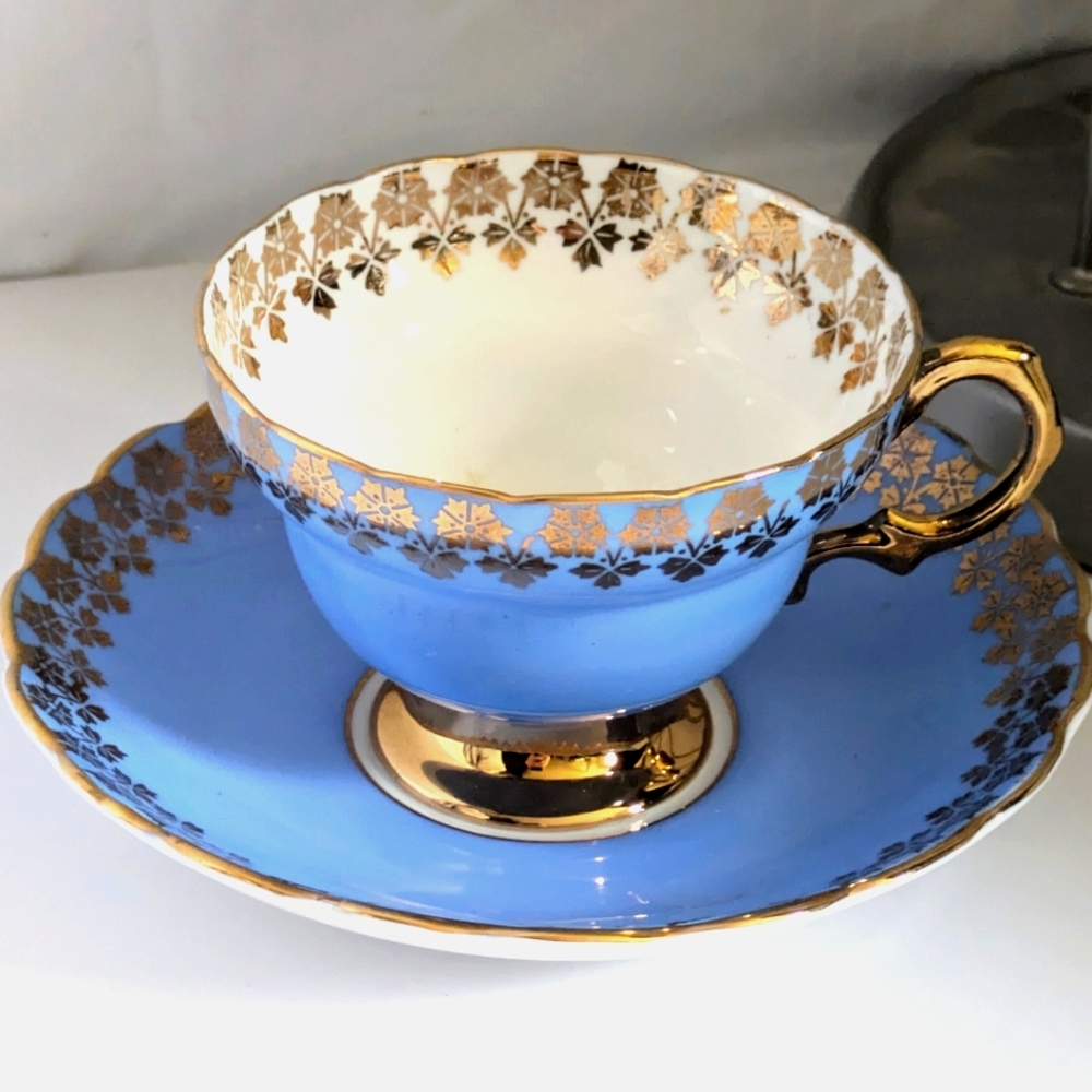 Rosina Bone China Footed Teacup and Saucer Periwinkle Blue Gold Flowers Vintage